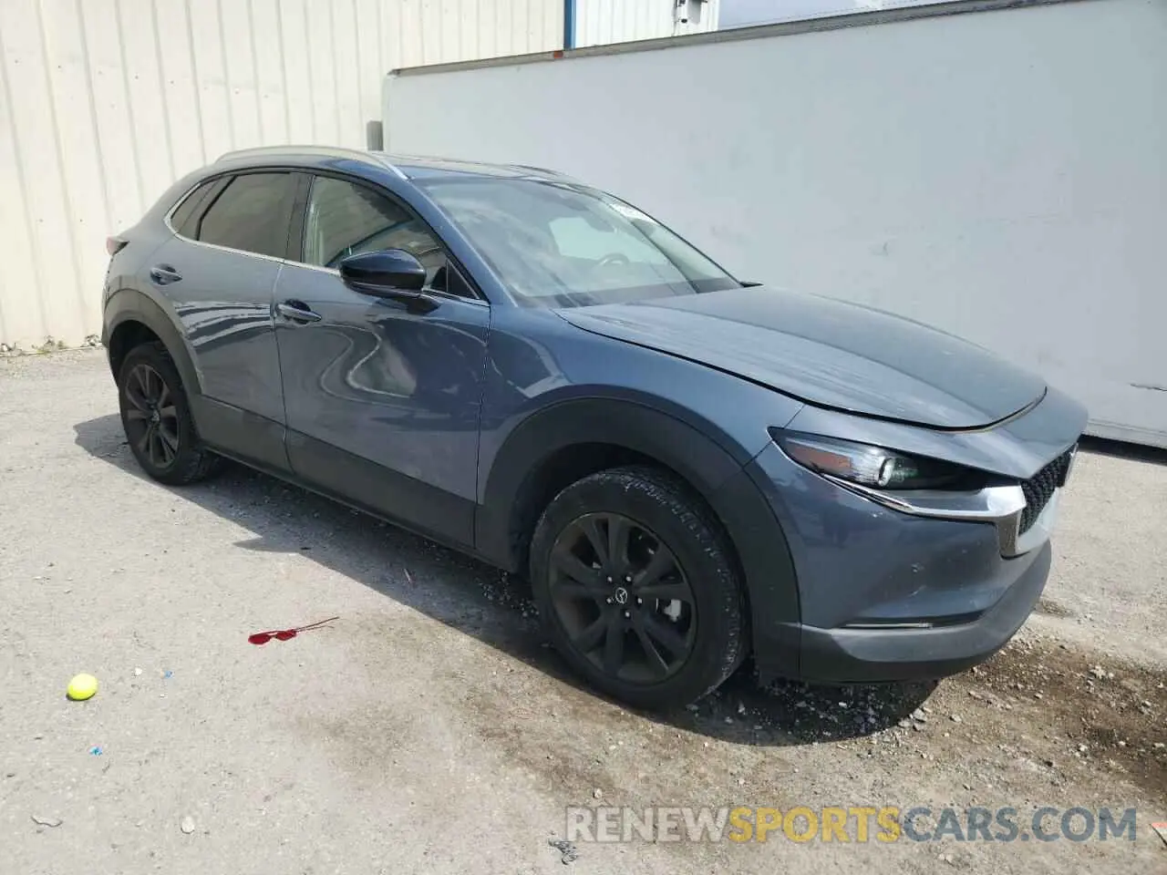 4 Photograph of a damaged car 3MVDMBCL8NM420177 MAZDA CX30 2022