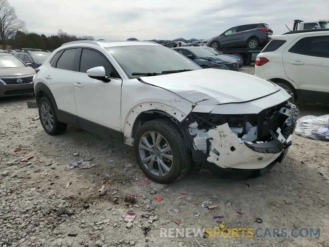 4 Photograph of a damaged car 3MVDMBCL9NM404733 MAZDA CX30 2022