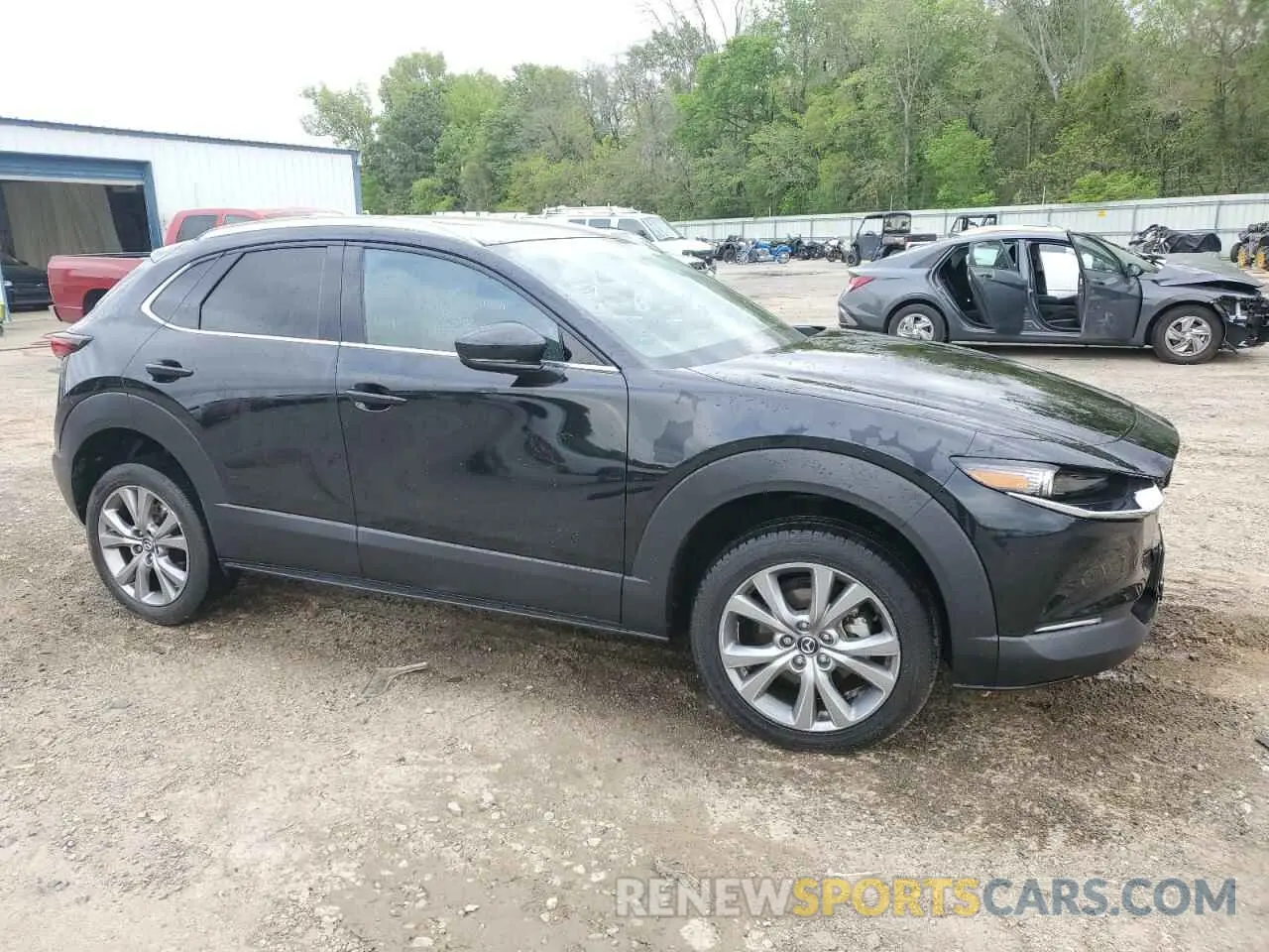 4 Photograph of a damaged car 3MVDMBDL2NM458065 MAZDA CX30 2022