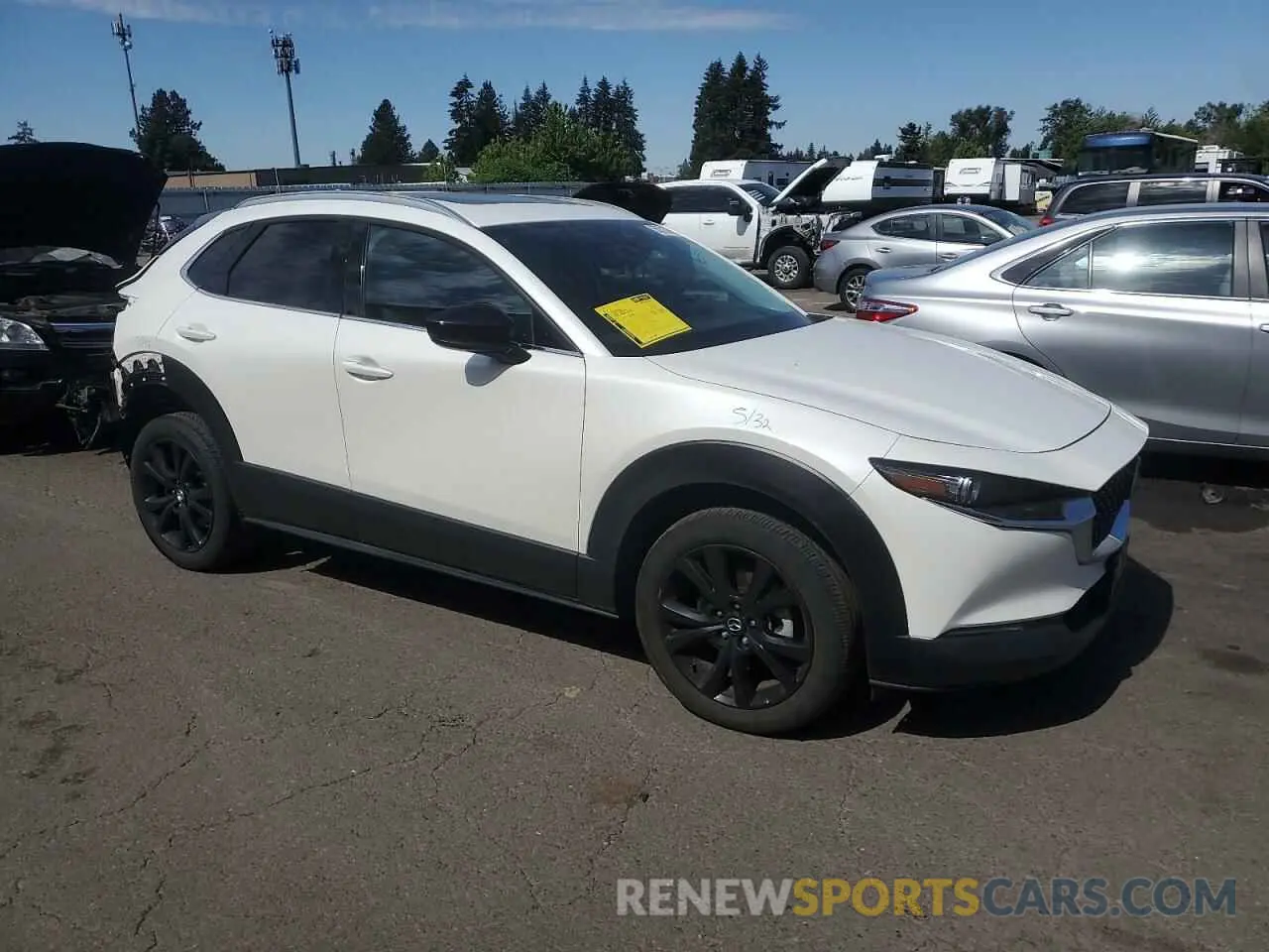 4 Фотография поврежденного автомобиля 3MVDMBDY4NM426830 MAZDA CX30 2022