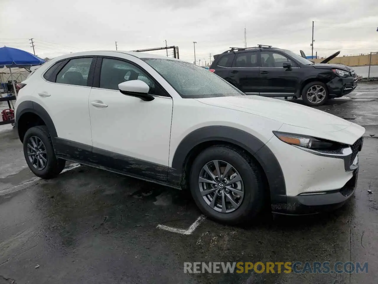 4 Фотография поврежденного автомобиля 3MVDMBAM4PM522056 MAZDA CX30 2023