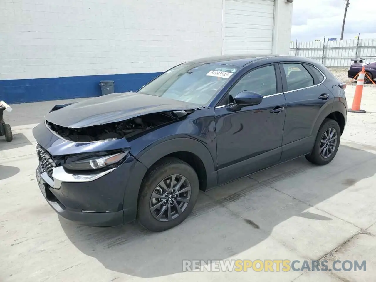 1 Photograph of a damaged car 3MVDMBAM4PM586047 MAZDA CX30 2023