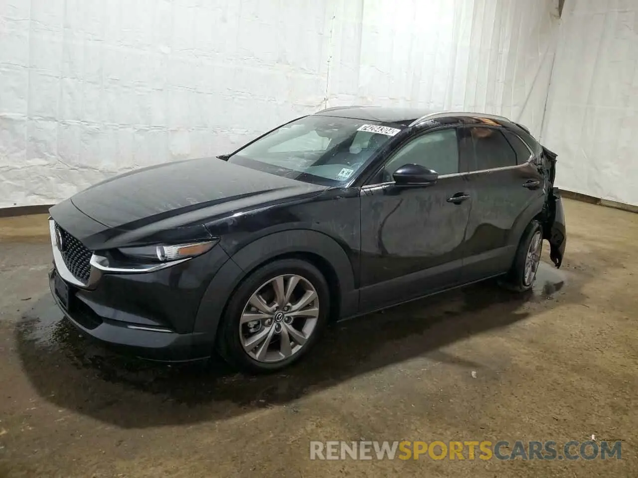 1 Photograph of a damaged car 3MVDMBBM0PM574671 MAZDA CX30 2023