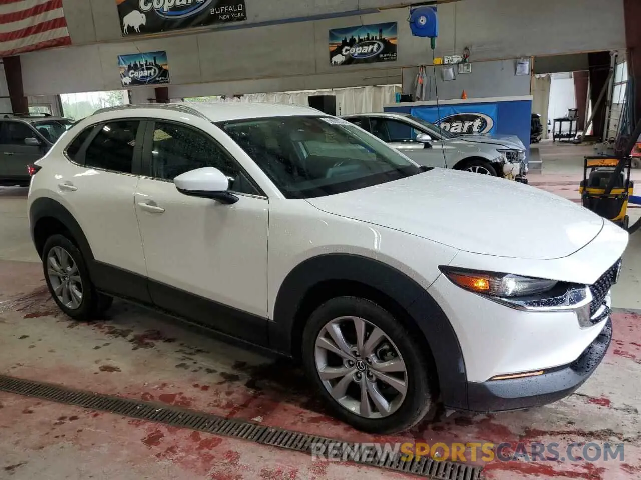4 Фотография поврежденного автомобиля 3MVDMBBM1PM532140 MAZDA CX30 2023