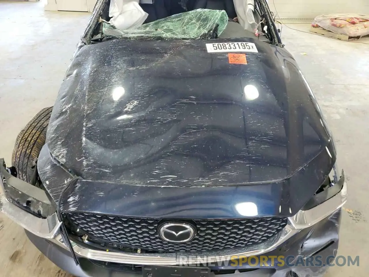 11 Фотография поврежденного автомобиля 3MVDMBBM1PM563758 MAZDA CX30 2023