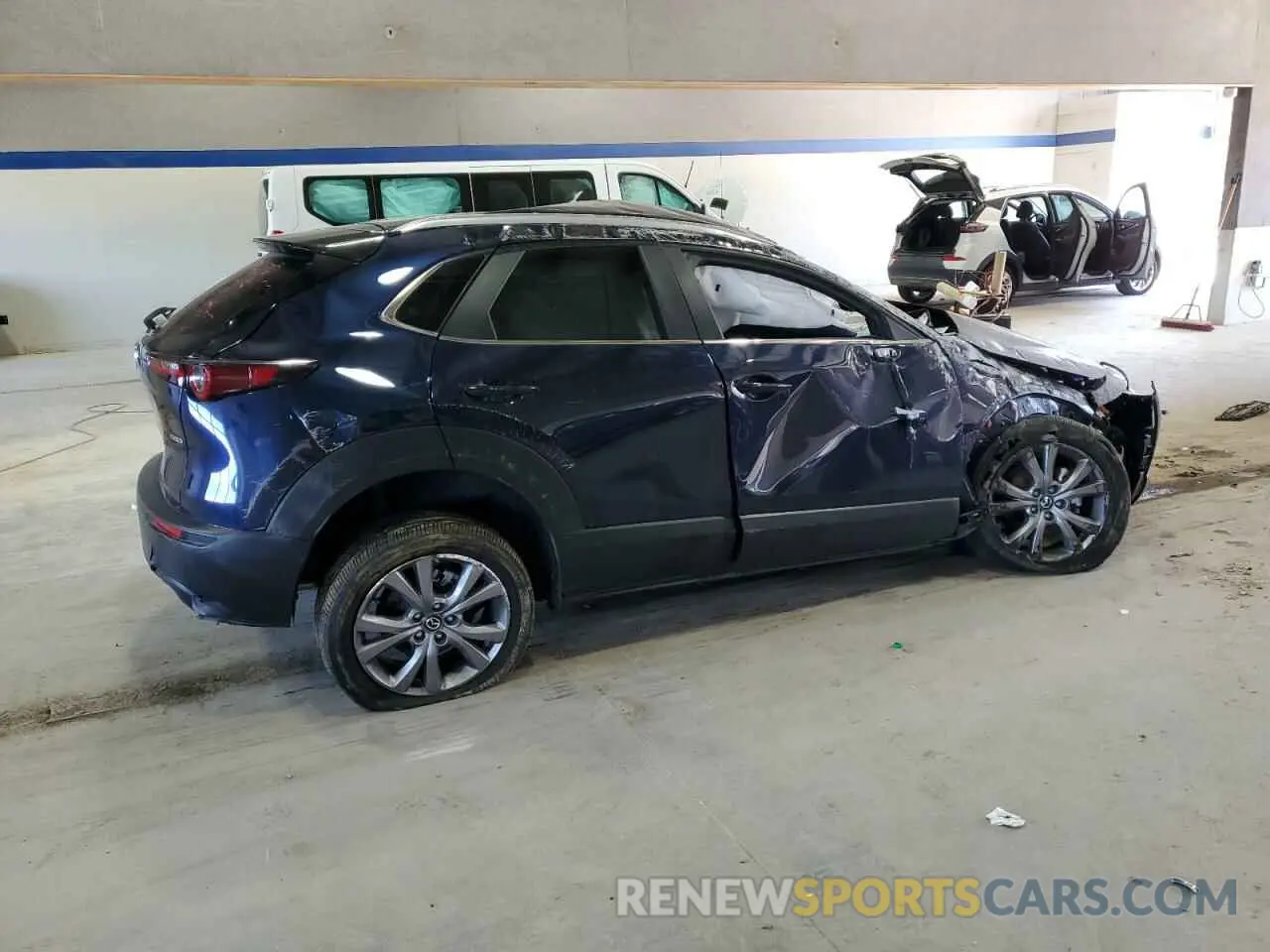 3 Фотография поврежденного автомобиля 3MVDMBBM1PM563758 MAZDA CX30 2023