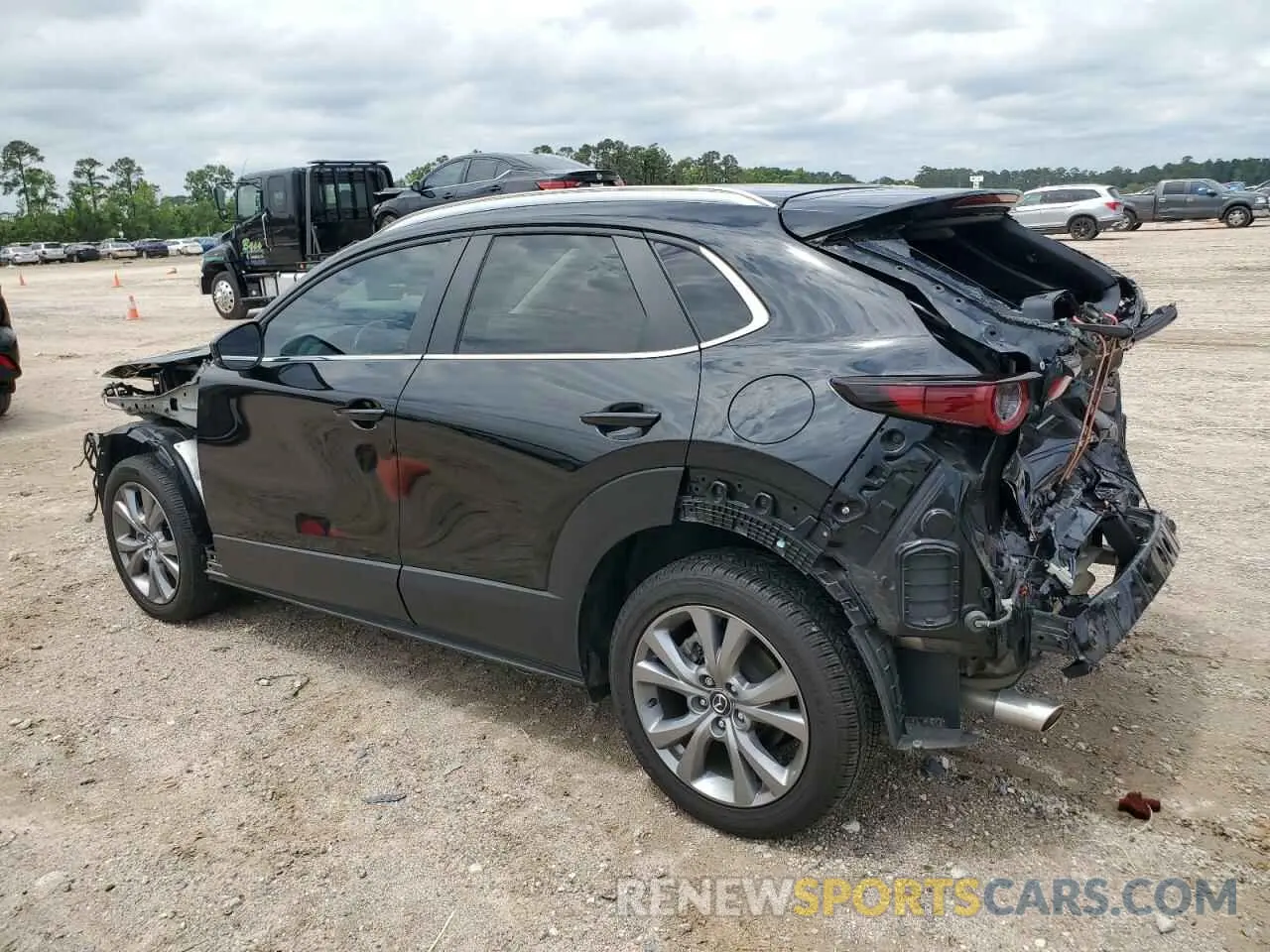 2 Photograph of a damaged car 3MVDMBBM3PM535847 MAZDA CX30 2023