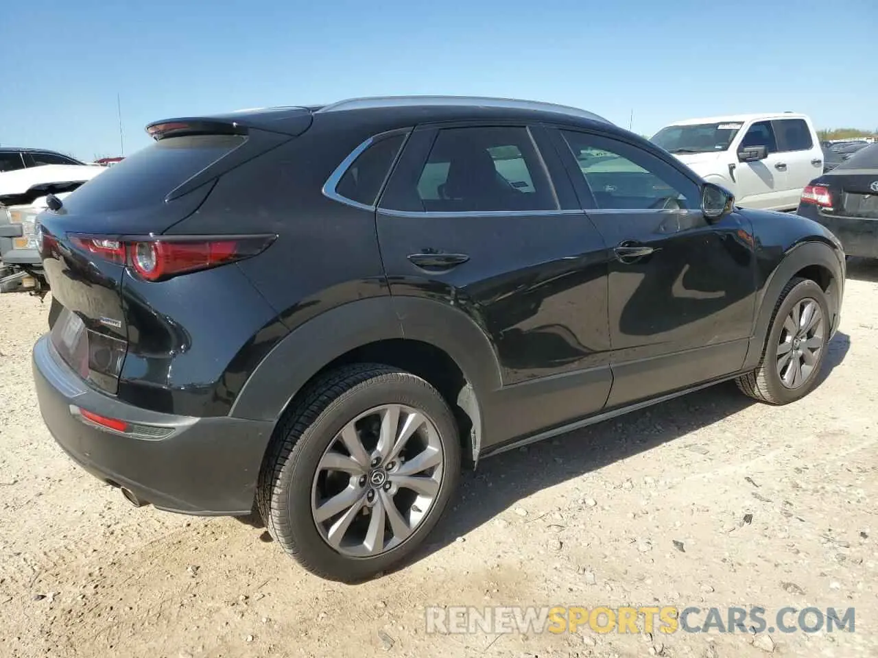 3 Photograph of a damaged car 3MVDMBBM3PM572395 MAZDA CX30 2023