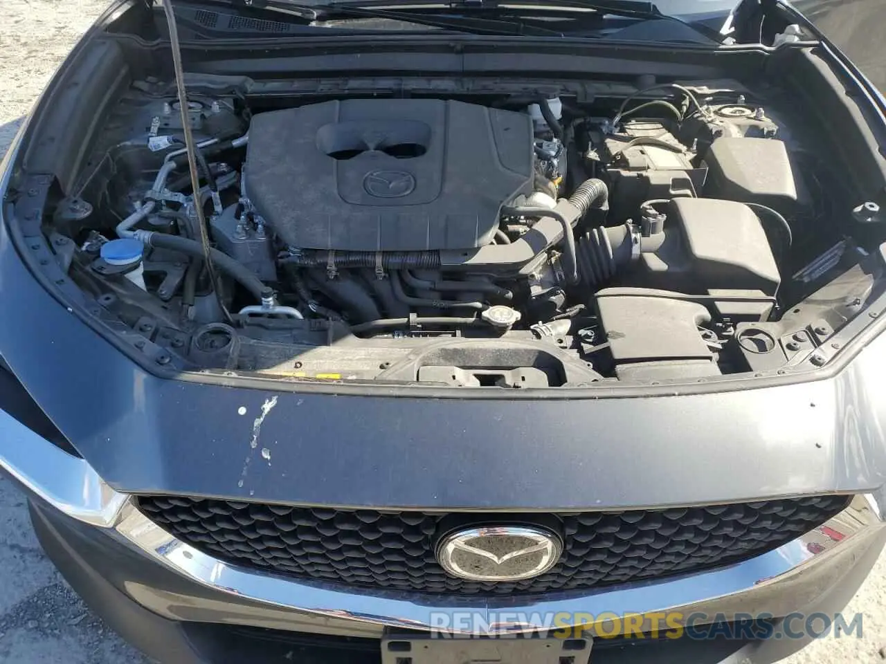 13 Фотография поврежденного автомобиля 3MVDMBBM3PM572719 MAZDA CX30 2023
