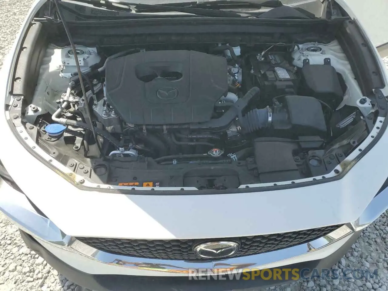 11 Фотография поврежденного автомобиля 3MVDMBBM8PM576779 MAZDA CX30 2023
