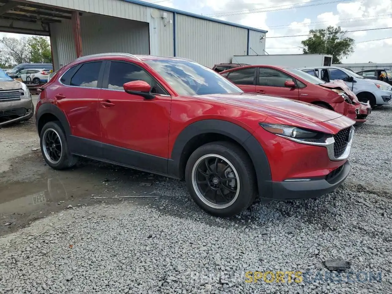 4 Фотография поврежденного автомобиля 3MVDMBCM0PM533469 MAZDA CX30 2023