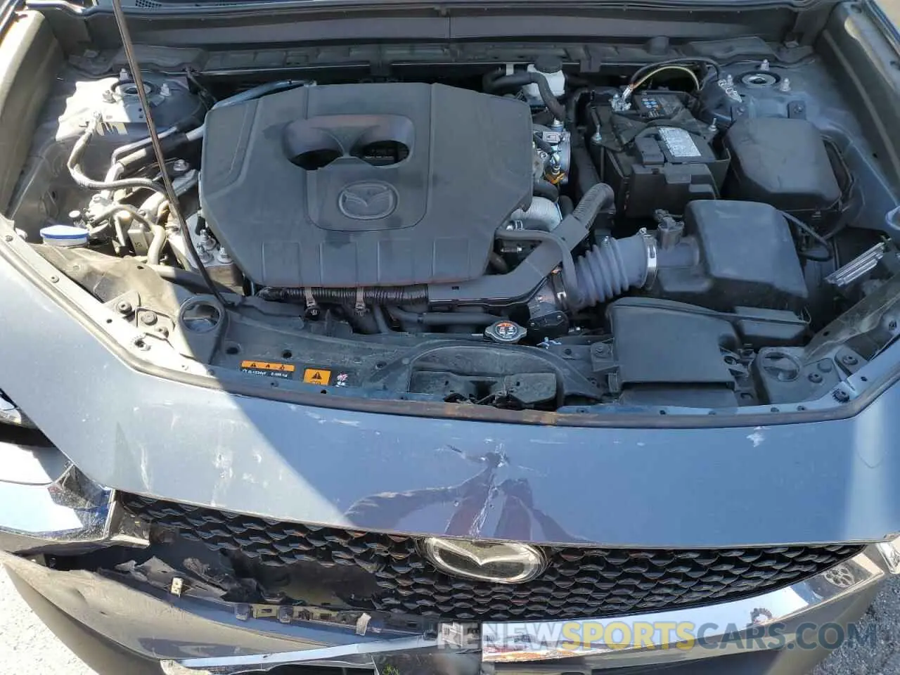 12 Фотография поврежденного автомобиля 3MVDMBCM0PM542768 MAZDA CX30 2023