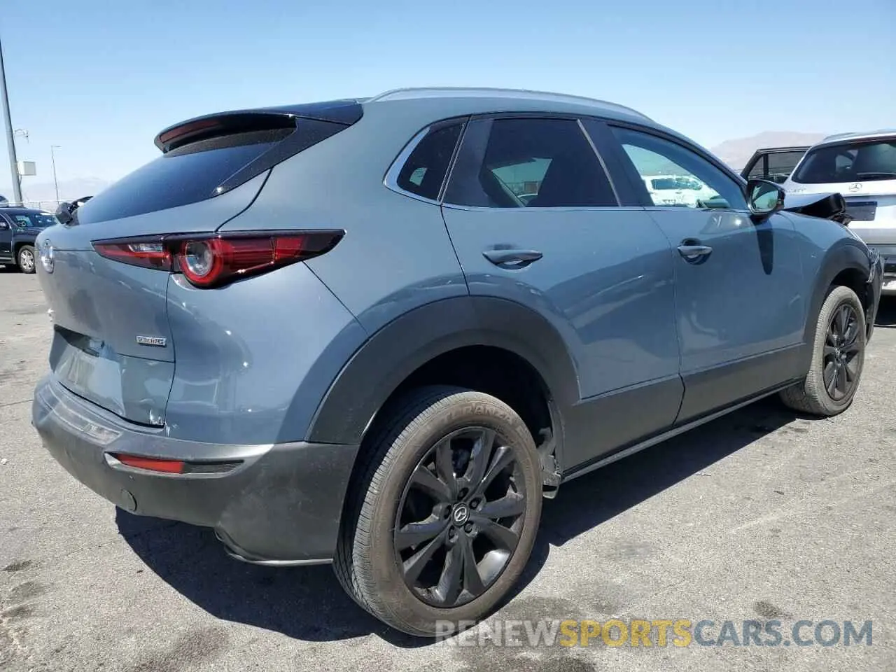 3 Фотография поврежденного автомобиля 3MVDMBCM0PM542768 MAZDA CX30 2023