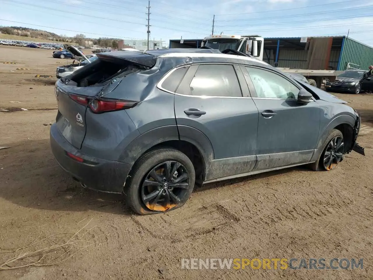 3 Photograph of a damaged car 3MVDMBCM2PM521419 MAZDA CX30 2023