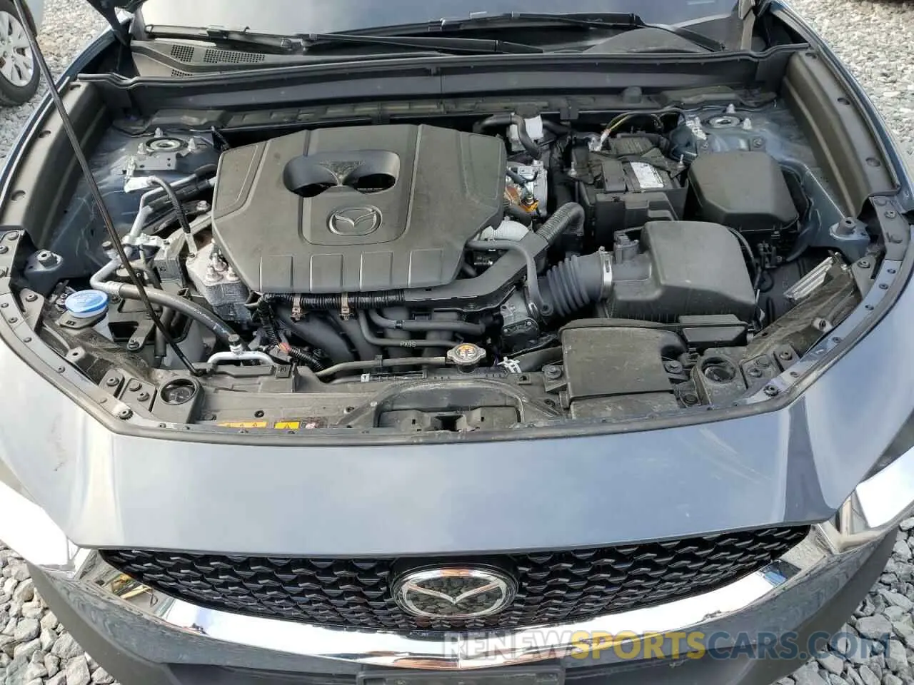 11 Фотография поврежденного автомобиля 3MVDMBCM2PM574041 MAZDA CX30 2023