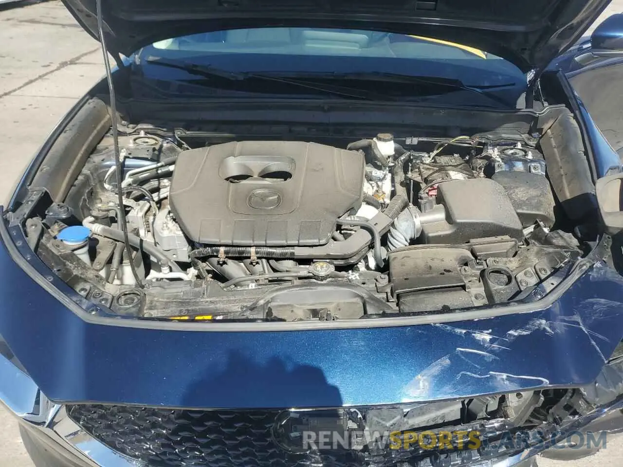 12 Фотография поврежденного автомобиля 3MVDMBCM3PM554378 MAZDA CX30 2023
