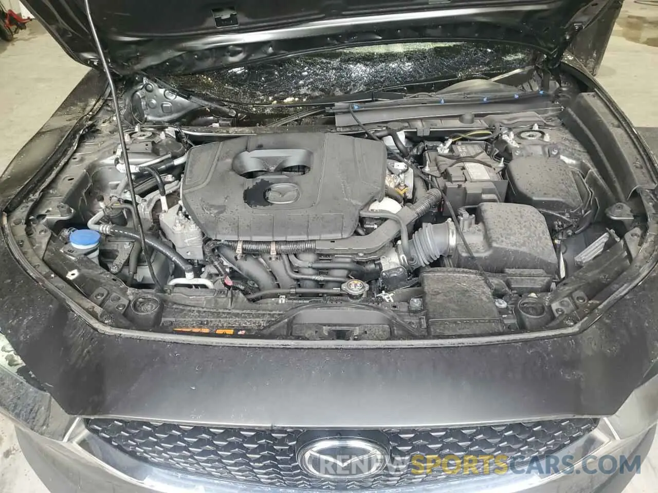 12 Photograph of a damaged car 3MVDMBCM9PM516797 MAZDA CX30 2023
