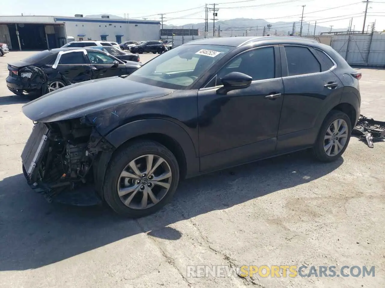 1 Photograph of a damaged car 3MVDMBCMXPM550988 MAZDA CX30 2023