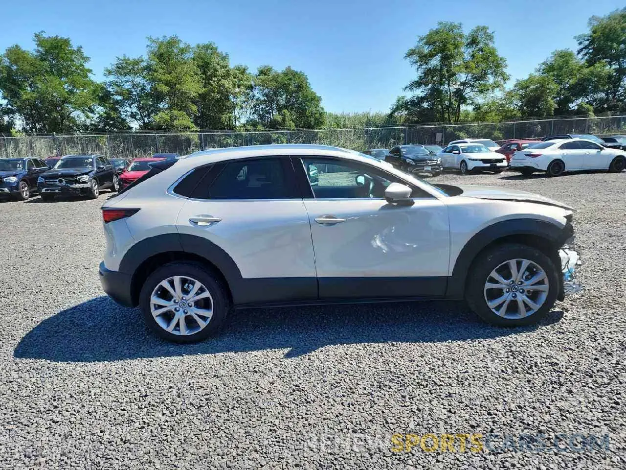 14 Фотография поврежденного автомобиля 3MVDMBDM1PM568102 MAZDA CX30 2023
