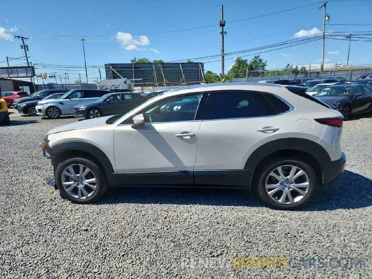 15 Фотография поврежденного автомобиля 3MVDMBDM1PM568102 MAZDA CX30 2023