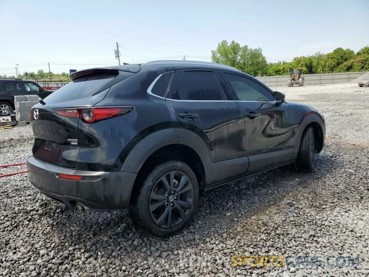 3 Photograph of a damaged car 3MVDMBDY8PM564406 MAZDA CX30 2023