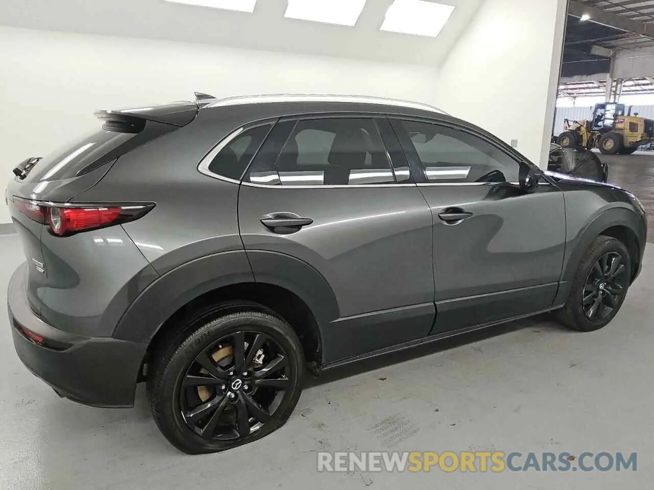 3 Photograph of a damaged car 3MVDMBDY9PM503985 MAZDA CX30 2023