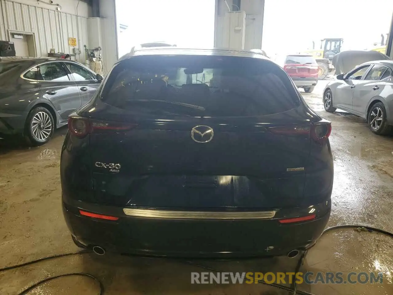 6 Photograph of a damaged car 3MVDMBCM3RM610113 MAZDA CX30 2024