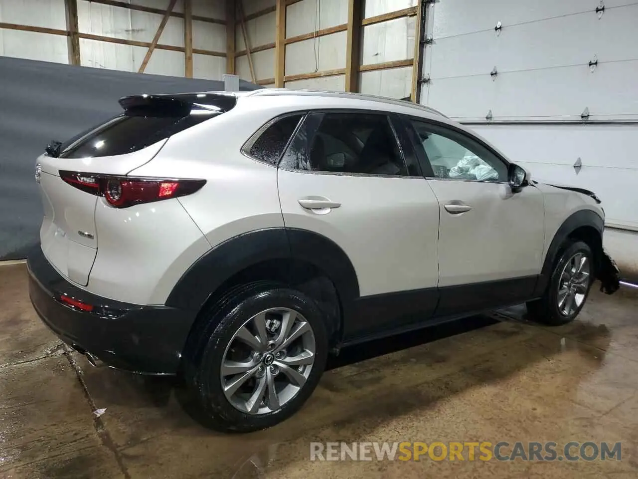 3 Photograph of a damaged car 3MVDMBCM3RM650174 MAZDA CX30 2024