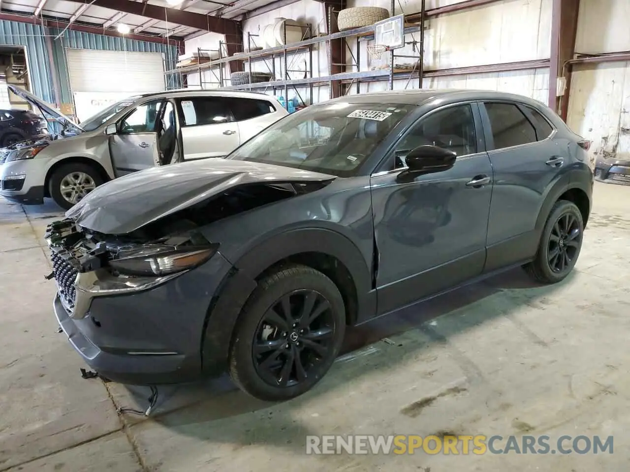 1 Photograph of a damaged car 3MVDMBCM3RM650546 MAZDA CX30 2024