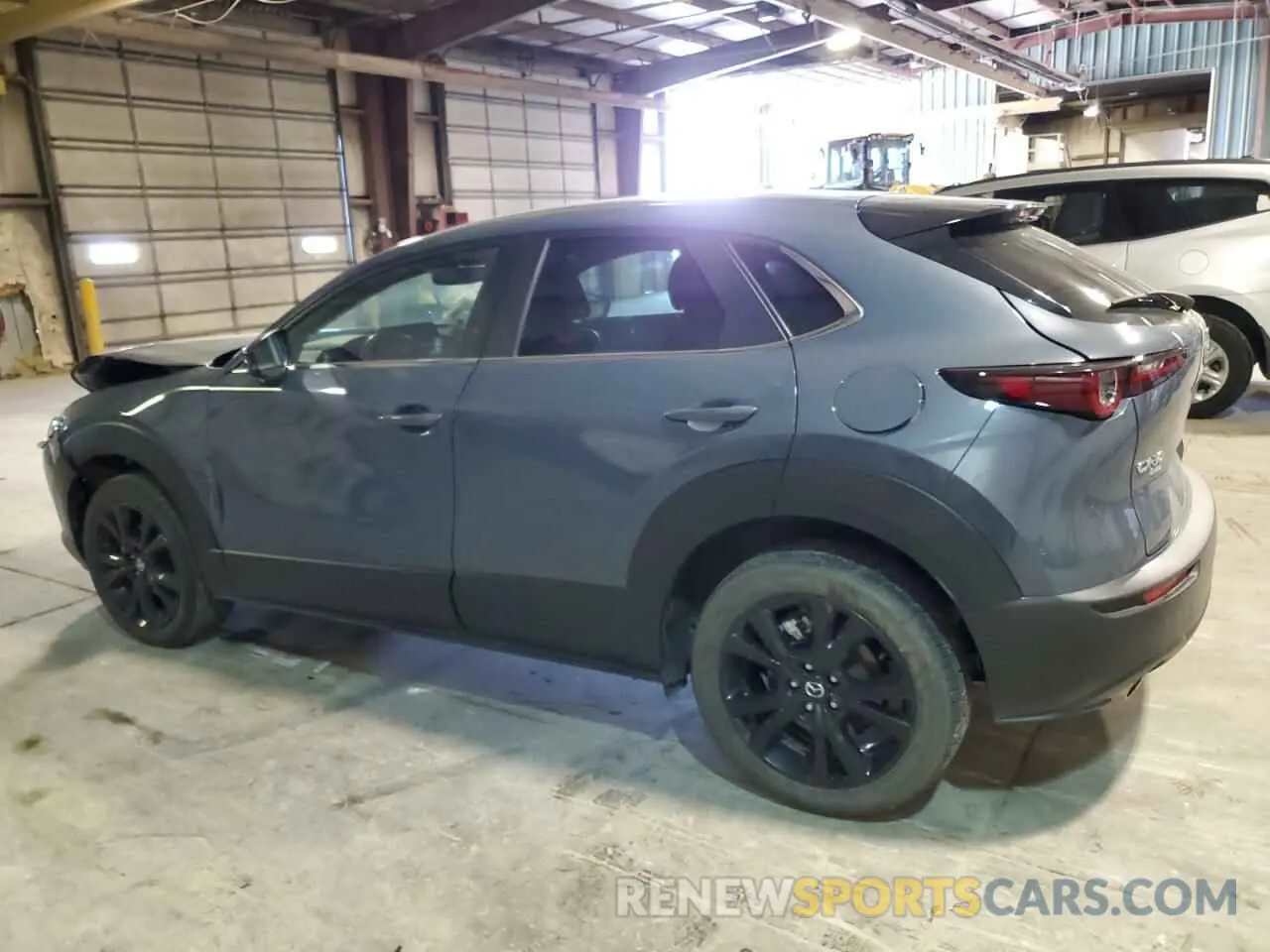 2 Photograph of a damaged car 3MVDMBCM3RM650546 MAZDA CX30 2024