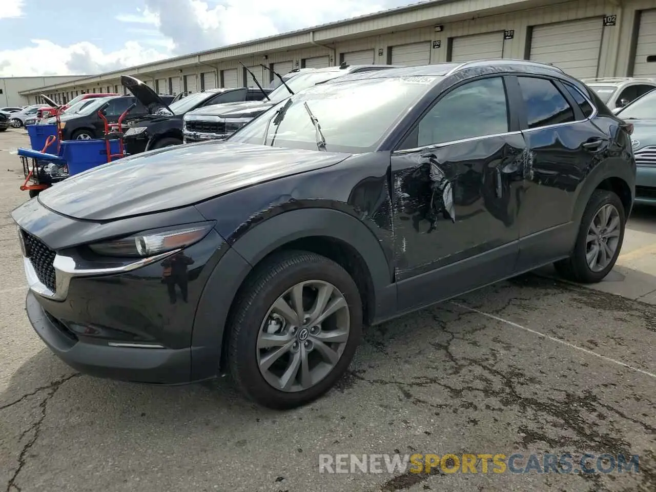 1 Photograph of a damaged car 3MVDMBCM6RM690894 MAZDA CX30 2024