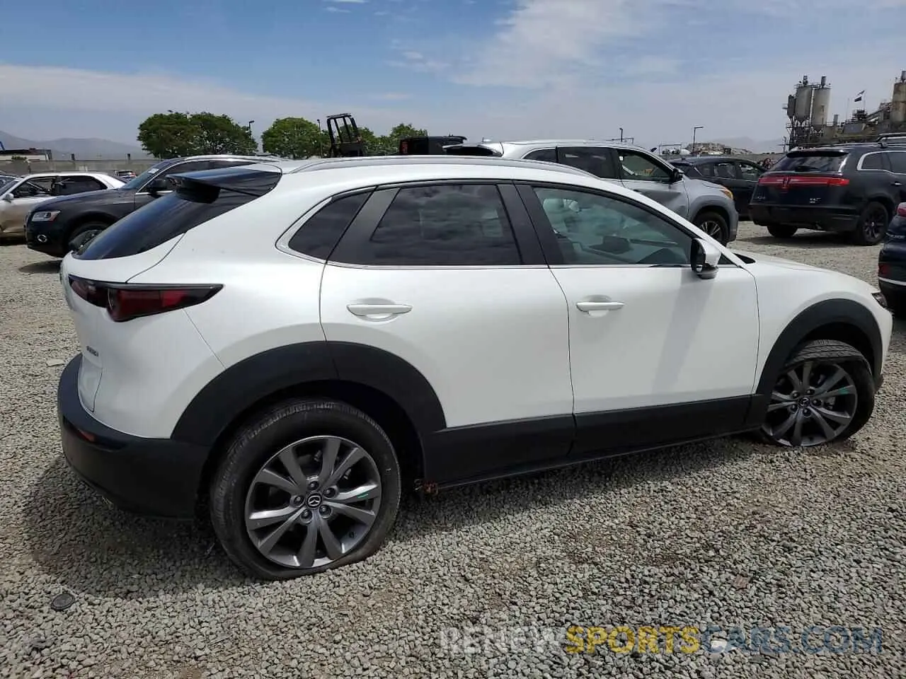 3 Фотография поврежденного автомобиля 3MVDMBCM8RM625691 MAZDA CX30 2024
