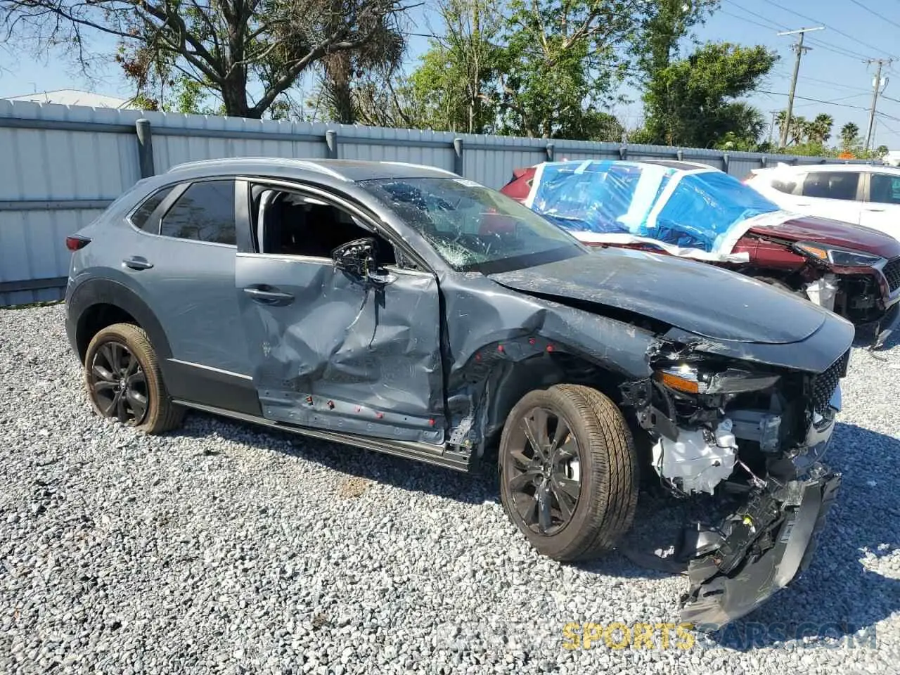4 Photograph of a damaged car 3MVDMBCMXSM764341 MAZDA CX30 2025