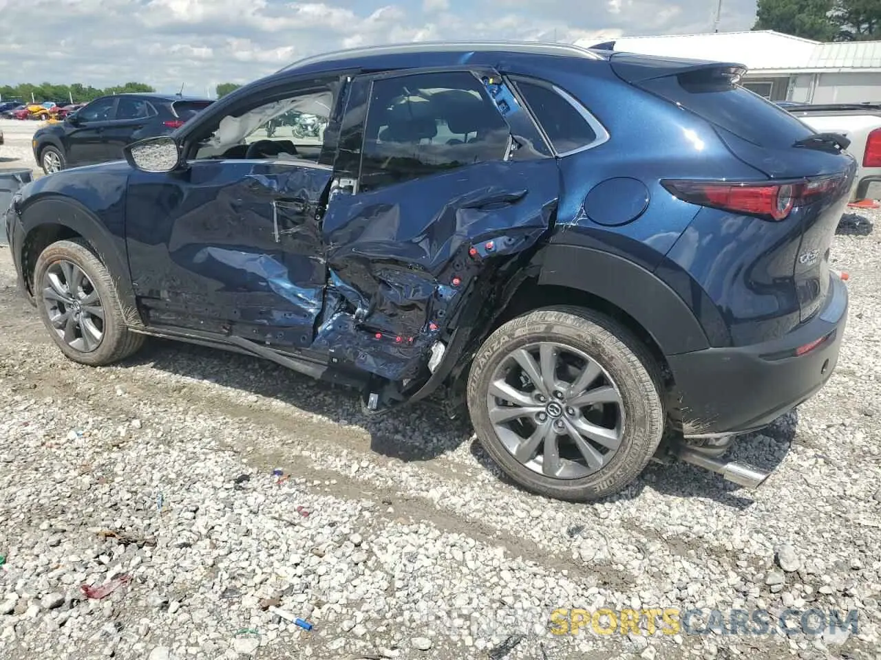 2 Фотография поврежденного автомобиля 3MVDMBDM3SM830422 MAZDA CX30 2025