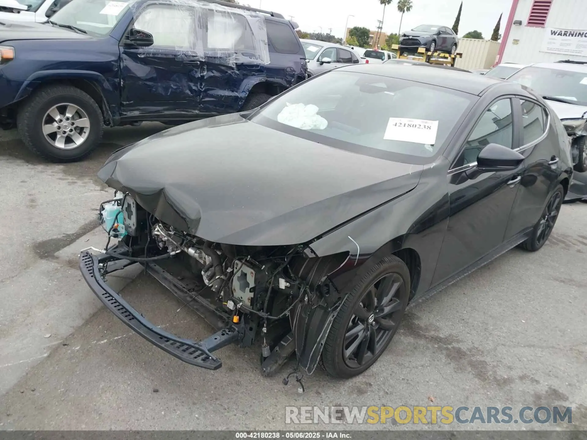 2 Photograph of a damaged car JM1BPAKM2R1716321 MAZDA MAZDA3 2024