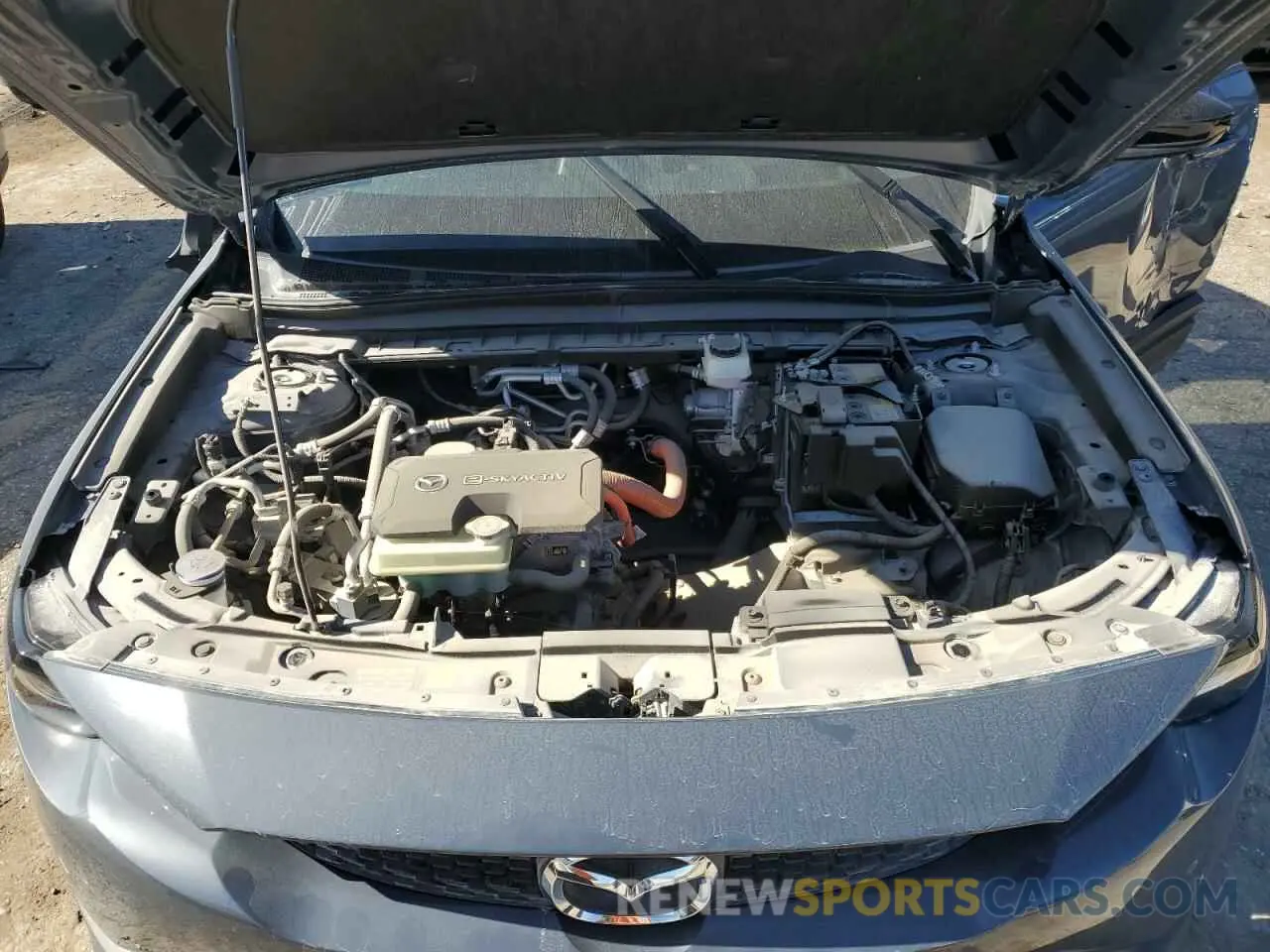 12 Фотография поврежденного автомобиля JM1DRADB9N0100579 MAZDA MX-30 PREM 2022