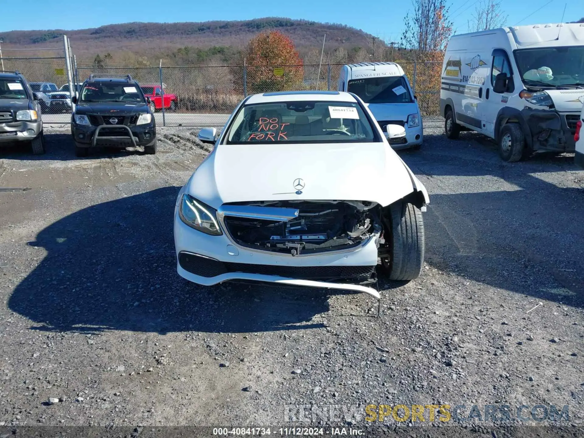 12 Photograph of a damaged car WDDZF4KB1KA512591 MERCEDES-BENZ E 300 2019