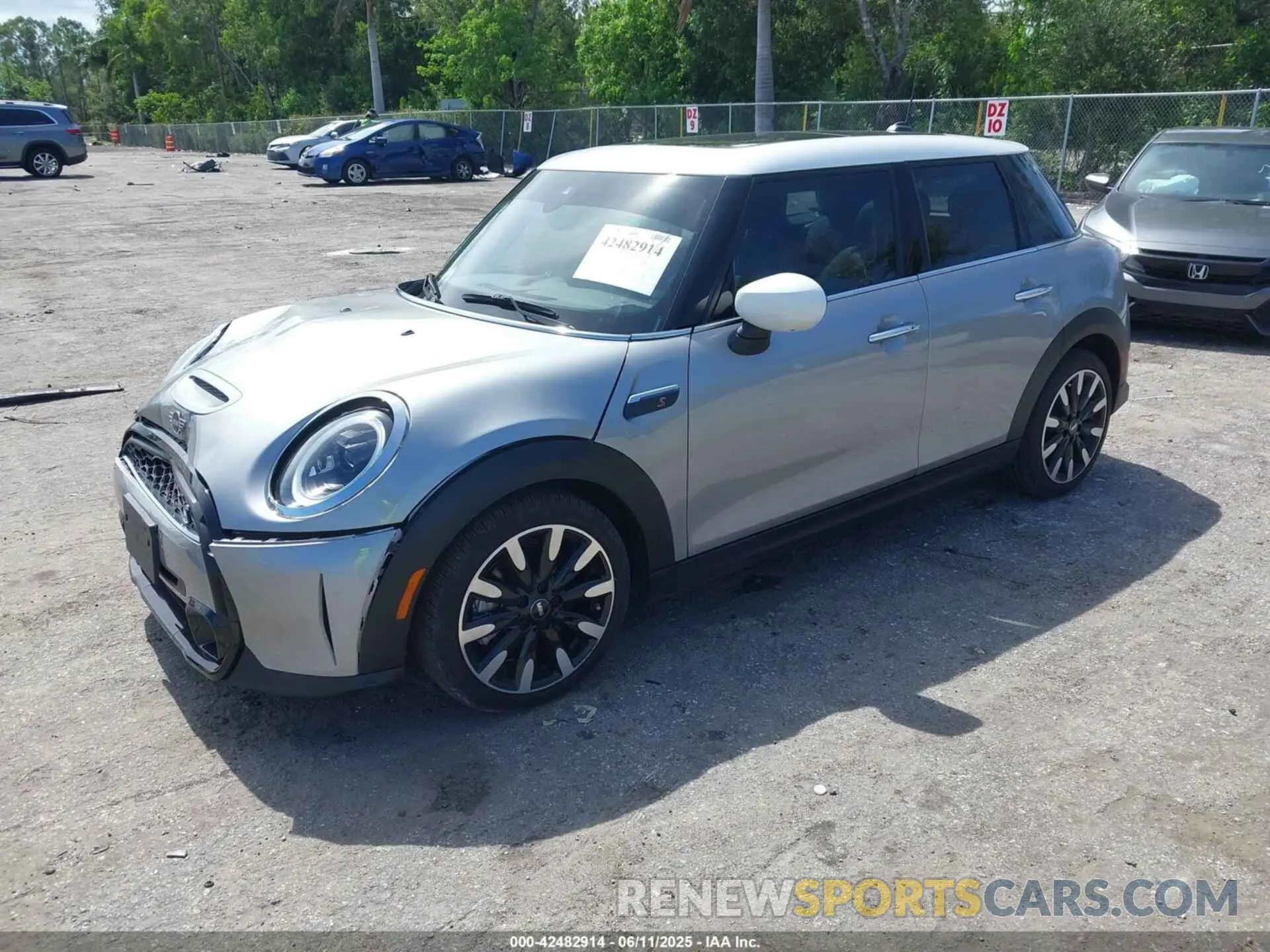 2 Photograph of a damaged car WMW53DK02R2V54074 MINI HARDTOP 2024