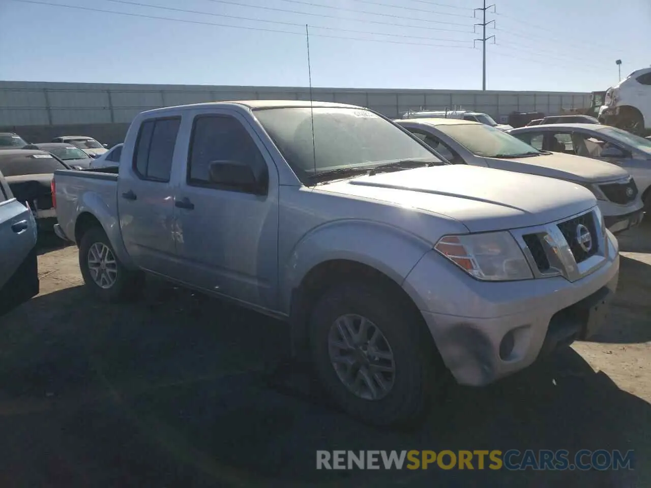 4 Photograph of a damaged car 1N6AD0EV7KN723781 NISSAN FRONTIER 2019