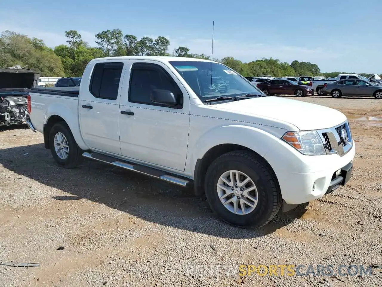 4 Photograph of a damaged car 1N6ED0EA3LN727553 NISSAN FRONTIER 2020