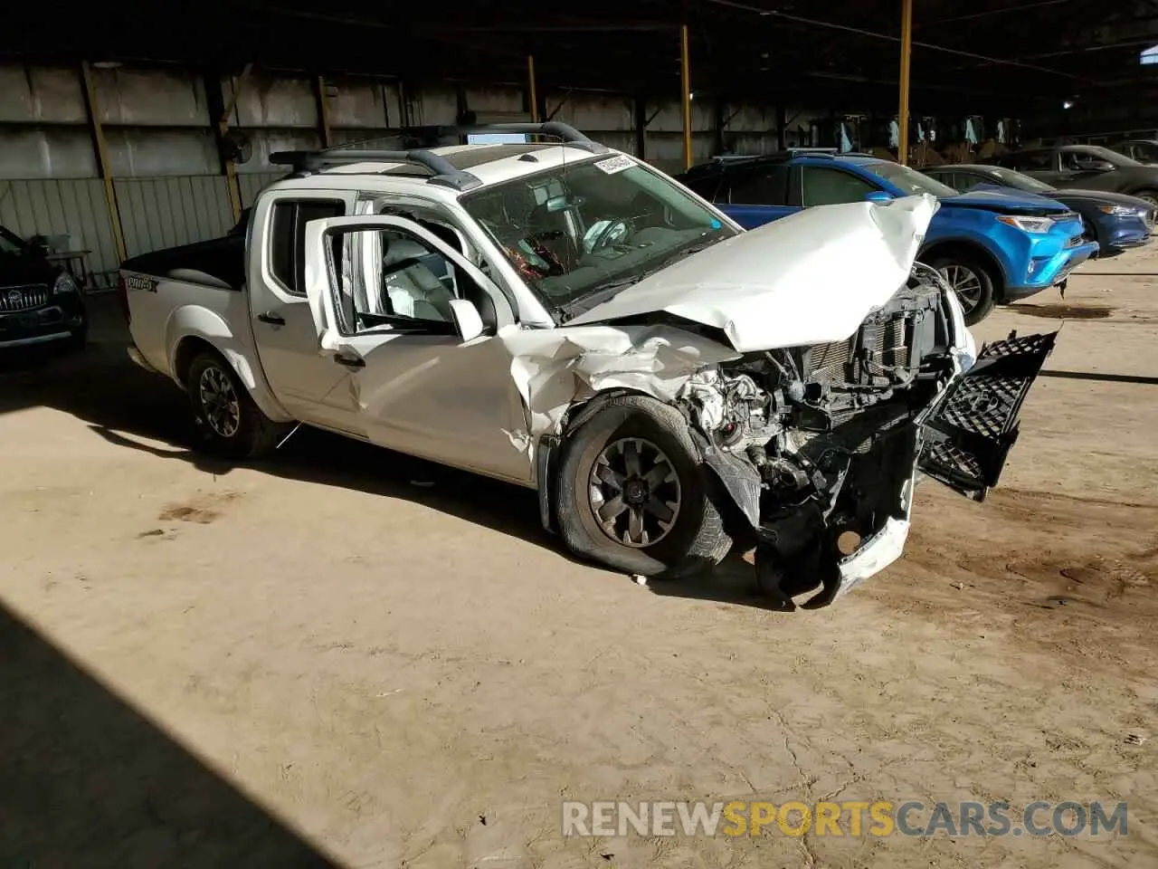4 Photograph of a damaged car 1N6ED0EB7LN703345 NISSAN FRONTIER 2020
