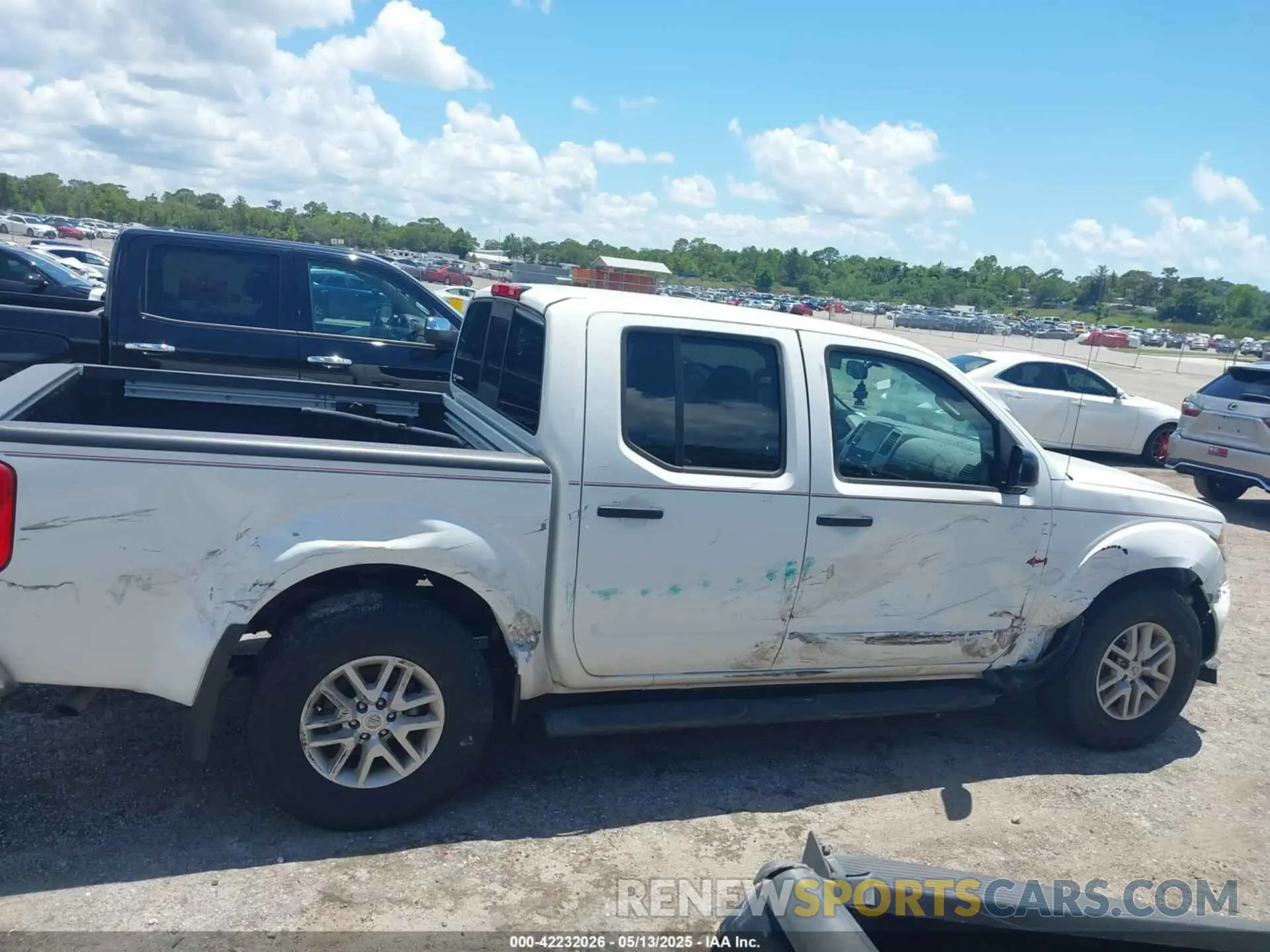 13 Photograph of a damaged car 1N6ED0EA8MN709955 NISSAN FRONTIER 2021