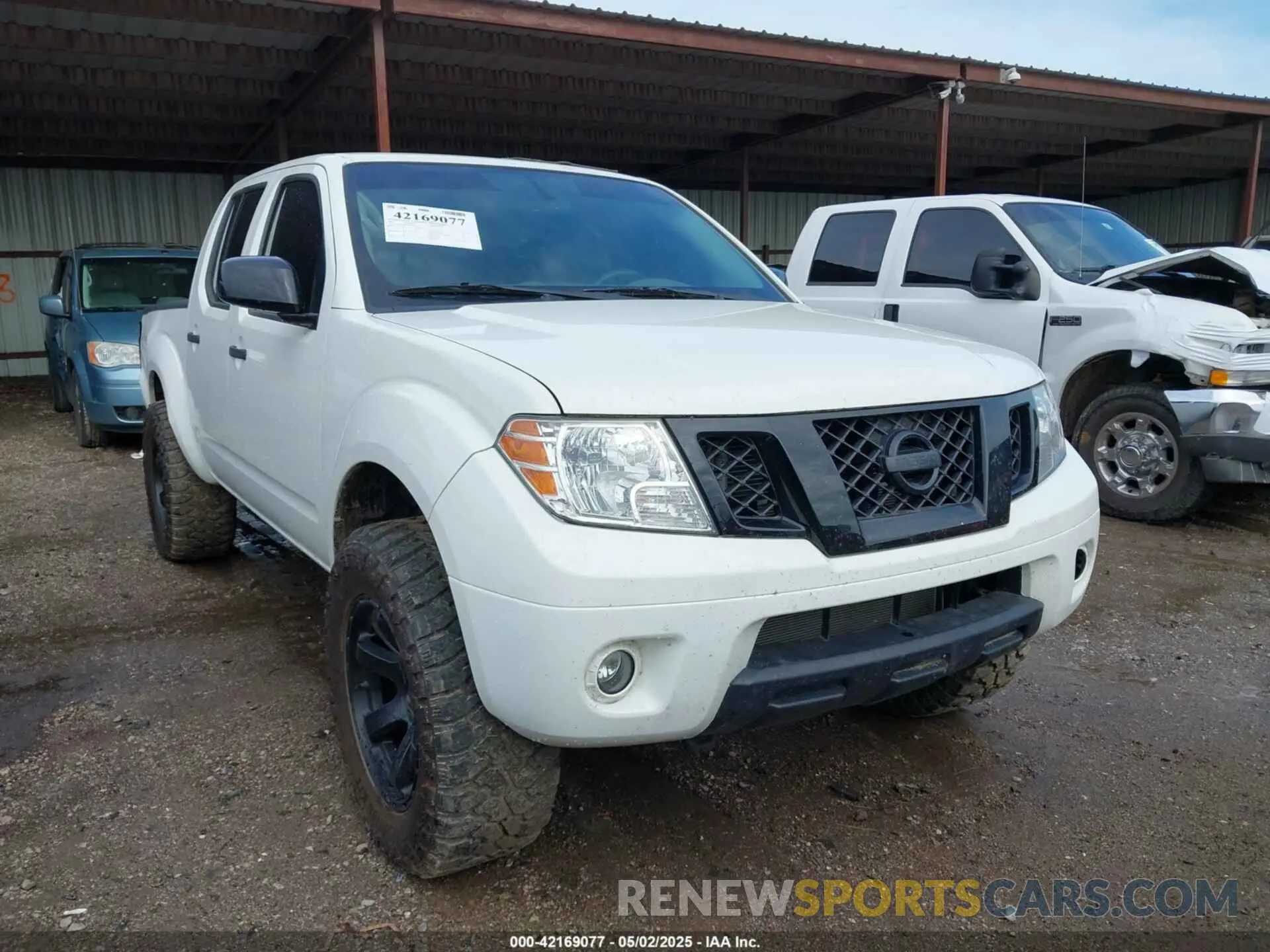 1 Photograph of a damaged car 1N6ED0EB9MN706099 NISSAN FRONTIER 2021