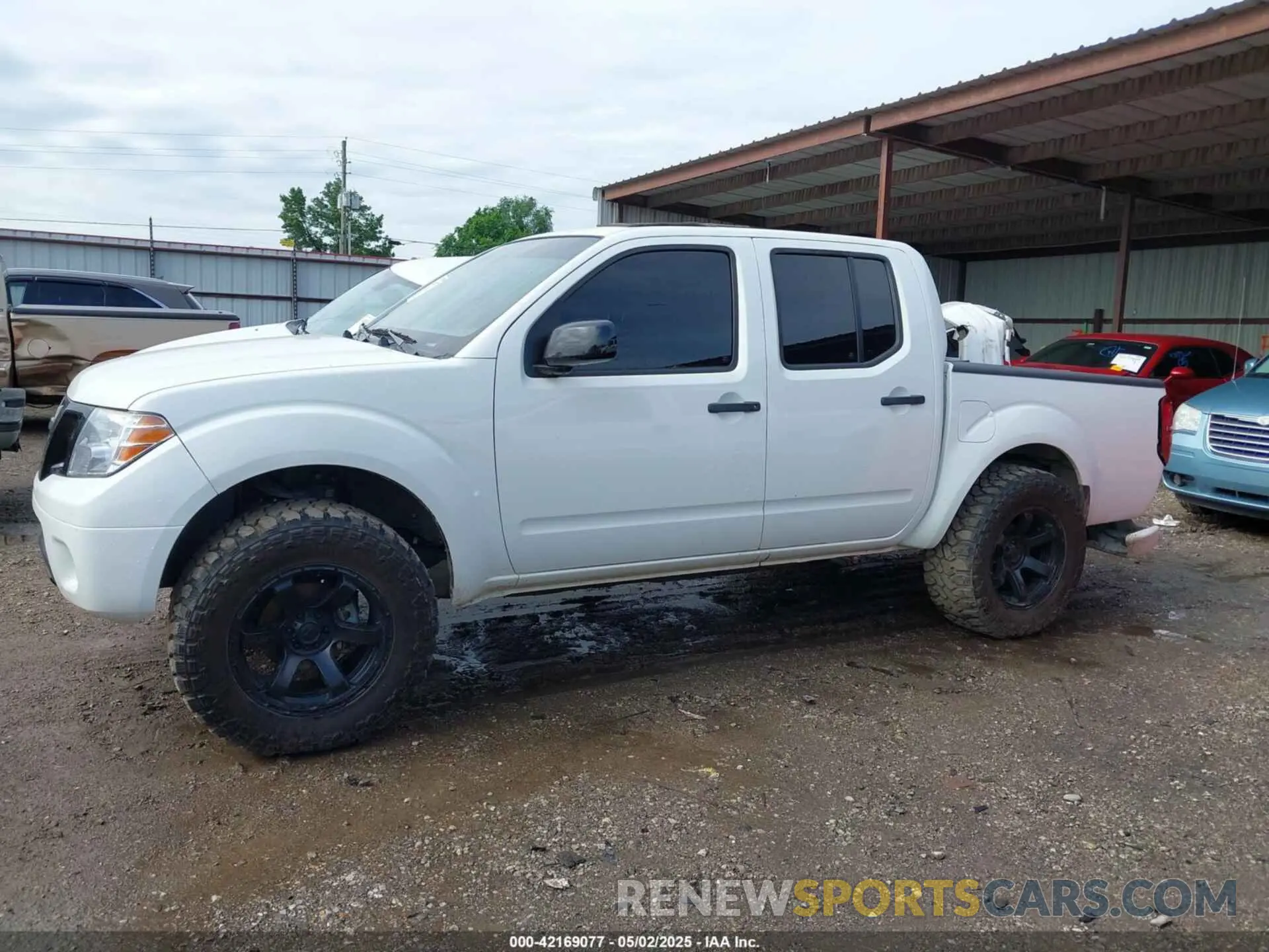 14 Photograph of a damaged car 1N6ED0EB9MN706099 NISSAN FRONTIER 2021
