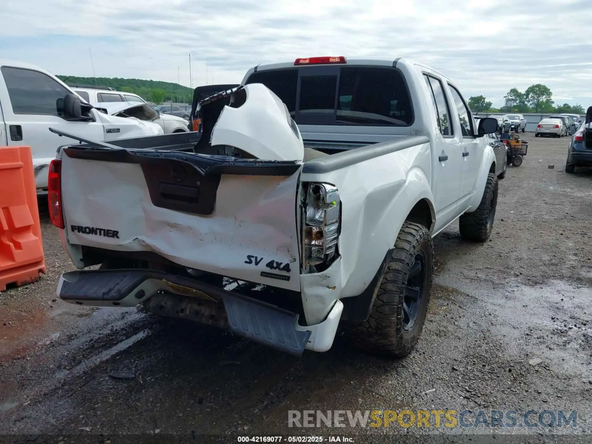 4 Photograph of a damaged car 1N6ED0EB9MN706099 NISSAN FRONTIER 2021