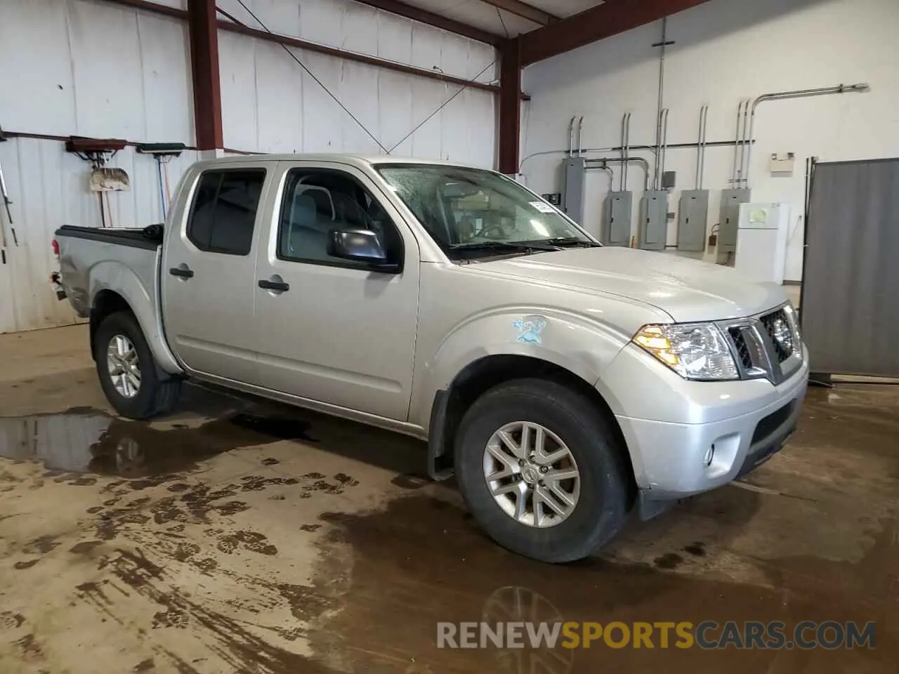 4 Photograph of a damaged car 1N6ED0EBXMN718990 NISSAN FRONTIER 2021