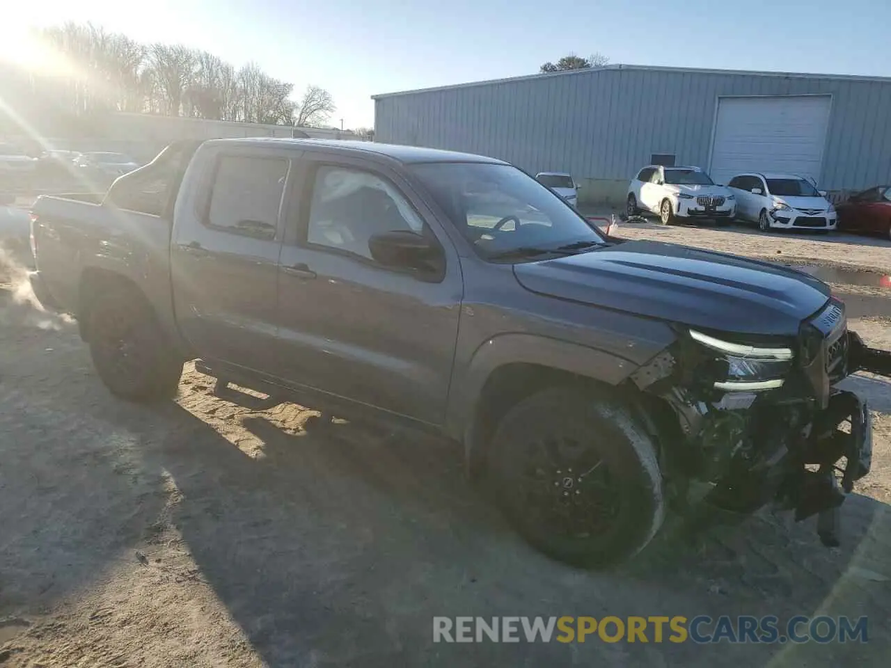 4 Photograph of a damaged car 1N6ED1EK7PN672948 NISSAN FRONTIER 2023