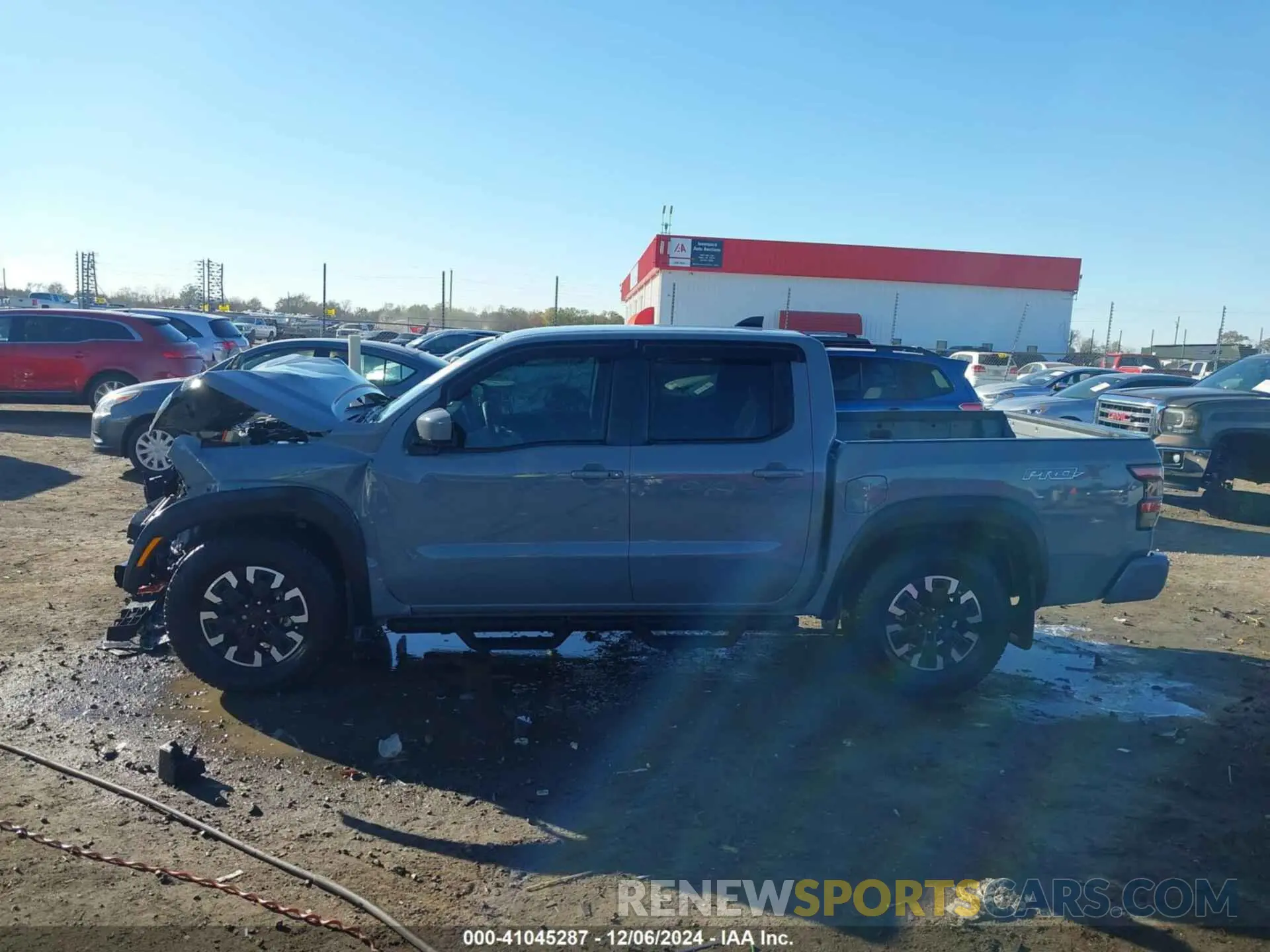 13 Photograph of a damaged car 1N6ED1EJ0RN608695 NISSAN FRONTIER 2024