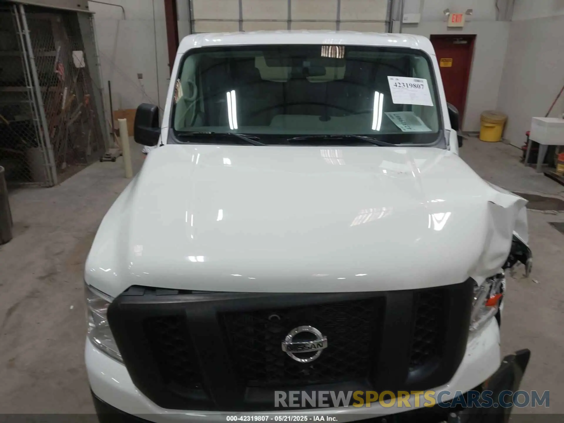 10 Photograph of a damaged car 1N6BF0KM3KN800446 NISSAN NV CARGO NV1500 2019