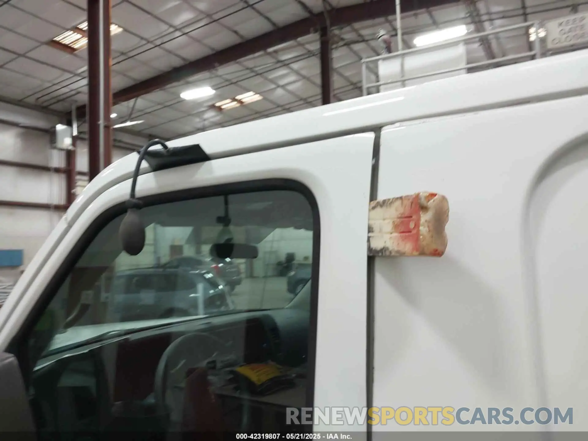 16 Photograph of a damaged car 1N6BF0KM3KN800446 NISSAN NV CARGO NV1500 2019
